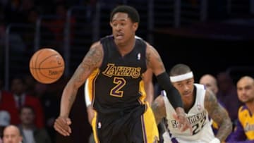 Feb 28, 2014; Los Angeles, CA, USA; Los Angeles Lakers guard MarShon Brooks (2) and Sacramento Kings guard Isaiah Thomas (22) battle for the ball at Staples Center. The Lakers defeated the Kings 126-122. Mandatory Credit: Kirby Lee-USA TODAY Sports