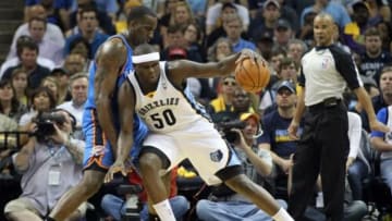 Apr 26, 2014; Memphis, TN, USA; Memphis Grizzlies forward Zach Randolph (50) drives against Oklahoma City Thunder center Kendrick Perkins (5) during game four of the first round of the 2014 NBA Playoffs at FedExForum. Thunder defeated the Grizzlies 92-89. Mandatory Credit: Nelson Chenault-USA TODAY Sports