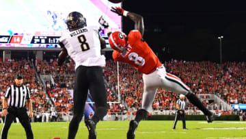ATHENS, GA - OCTOBER 6: Riley Ridley #8 of the Georgia Bulldogs makes a catch for a second quarter touchdown against JoeJuan Williams #8 of the Vanderbilt Commodores on October 6, 2018 at Sanford Stadium in Athens, Georgia. (Photo by Scott Cunningham/Getty Images)