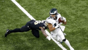 NEW ORLEANS, LOUISIANA - JANUARY 13: Golden Tate #19 of the Philadelphia Eagles avoids the tackle attempt of P.J. Williams #26 of the New Orleans Saints during the first quarter in the NFC Divisional Playoff Game at Mercedes Benz Superdome on January 13, 2019 in New Orleans, Louisiana. (Photo by Jonathan Bachman/Getty Images)