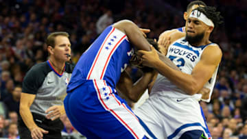 PHILADELPHIA, PA - OCTOBER 30: Joel Embiid #21 of the Philadelphia 76ers fights with Karl-Anthony Towns #32 of the Minnesota Timberwolves in the third quarter at the Wells Fargo Center on October 30, 2019 in Philadelphia, Pennsylvania. The 76ers defeated the Wolves 117-95. NOTE TO USER: User expressly acknowledges and agrees that, by downloading and or using this photograph, User is consenting to the terms and conditions of the Getty Images License Agreement. (Photo by Mitchell Leff/Getty Images)