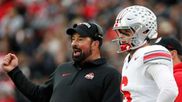 Ohio State Buckeyes head coach Ryan Day talks to Ohio State Buckeyes quarterback Kyle McCord (6) during the NCAA football game against the Purdue Boilermakers, Saturday, Oct. 14, 2023, at Ross-Ade Stadium in West Lafayette, Ind.
