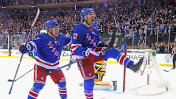 NEW YORK, NEW YORK - MAY 11: Frank Vatrano #77 and Filip Chytil #72 of the New York Rangers celebrate Chytil's third period goal against the Pittsburgh Penguins in Game Five of the First Round of the 2022 Stanley Cup Playoffs at Madison Square Garden on May 11, 2022 in New York City. The Rangers defeated the Penguins 5-3. (Photo by Bruce Bennett/Getty Images)
