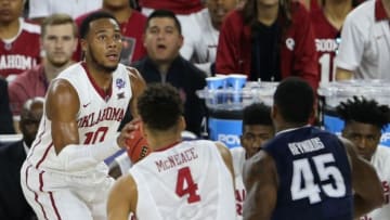 Apr 2, 2016; Houston, TX, USA; Oklahoma Sooners guard Jordan Woodard (10) looks to shoot while guarded by Villanova Wildcats forward Darryl Reynolds (45) during the second half in the 2016 NCAA Men