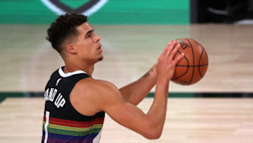 LAKE BUENA VISTA, FLORIDA - SEPTEMBER 01: Michael Porter Jr. #1 of the Denver Nuggets shoots the ball against the Utah Jazz in Game Seven of the Western Conference First Round during the 2020 NBA Playoffs at AdventHealth Arena at ESPN Wide World Of Sports Complex on September 01, 2020 in Lake Buena Vista, Florida. NOTE TO USER: User expressly acknowledges and agrees that, by downloading and or using this photograph, User is consenting to the terms and conditions of the Getty Images License Agreement. (Photo by Mike Ehrmann/Getty Images)