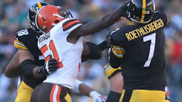 Nov 15, 2015; Pittsburgh, PA, USA; Cleveland Browns outside linebacker Barkevious Mingo (51) commits a roughing the passer penalty against Pittsburgh Steelers quarterback Ben Roethlisberger (7) during the second quarter at Heinz Field. Mandatory Credit: Charles LeClaire-USA TODAY Sports