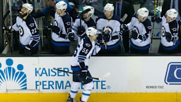 Apr 7, 2016; San Jose, CA, USA; Winnipeg Jets center Mark Scheifele (55) celebrates scoring a goal against the San Jose Sharks in the third period at SAP Center at San Jose. Winnipeg won 5-4. Mandatory Credit: John Hefti-USA TODAY Sports