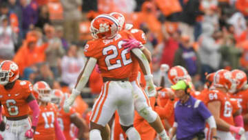 Clemson linebacker Trenton Simpson (22) celebrates sacking Florida State running back Jashaun Corbin (0) during the third quarter Oct 30, 2021 in Clemson, South Carolina.Ncaa Football Florida State At Clemson