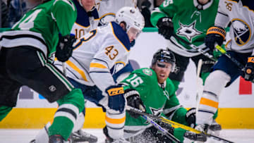 Jan 16, 2020; Dallas, Texas, USA; Dallas Stars center Joe Pavelski (16) and Buffalo Sabres left wing Conor Sheary (43) fight for the puck during the third period at the American Airlines Center. Mandatory Credit: Jerome Miron-USA TODAY Sports