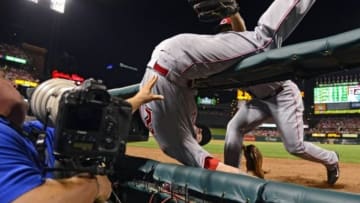 Sep 22, 2015; St. Louis, MO, USA; Cincinnati Reds third baseman Todd Frazier (21) flips over a railing as he catches a foul ball hit by St. Louis Cardinals first baseman Matt Adams (not pictured) during the fourth inning at Busch Stadium. Mandatory Credit: Jeff Curry-USA TODAY Sports