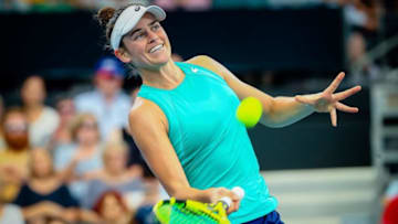 Jennifer Brady of the US celebrates her victory against Ashleigh Barty of Australia during their women's singles match at the Brisbane International tennis tournament in Brisbane on January 9, 2020. (Photo by Patrick HAMILTON / AFP) / -- IMAGE RESTRICTED TO EDITORIAL USE - STRICTLY NO COMMERCIAL USE -- (Photo by PATRICK HAMILTON/AFP /AFP via Getty Images)