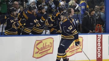 Mar 26, 2016; Buffalo, NY, USA; Buffalo Sabres right wing Hudson Fasching (52) celebrates his first career NHL goal during the first period against the Winnipeg Jets at First Niagara Center. Mandatory Credit: Timothy T. Ludwig-USA TODAY Sports