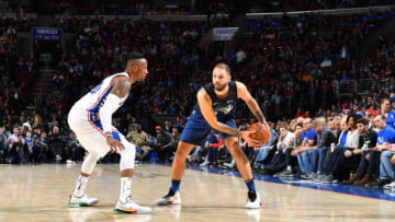 PHILADELPHIA,PA - FEBRUARY 24 : Evan Fournier #10 of the Orlando Magic looks to pass the ball against Philadelphia 76ers during game at the Wells Fargo Center on February 24, 2018 in Philadelphia, Pennsylvania NOTE TO USER: User expressly acknowledges and agrees that, by downloading and/or using this Photograph, user is consenting to the terms and conditions of the Getty Images License Agreement. Mandatory Copyright Notice: Copyright 2018 NBAE (Photo by Jesse D. Garrabrant/NBAE via Getty Images)