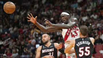 Toronto Raptors forward Pascal Siakam (43) passes the ball against Miami Heat guard Duncan Robinson (55) and guard Max Strus (31)(Jim Rassol-USA TODAY Sports)