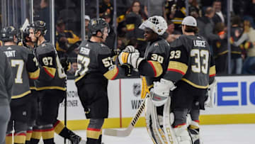 LAS VEGAS, NV - OCTOBER 15: Goalie Malcolm Subban #30 is congratulated by his teammate David Perron #57 of the Vegas Golden Knights after getting his first career NHL victory against the Boston Bruins during the game at T-Mobile Arena on October 15, 2017 in Las Vegas, Nevada. (Photo by Todd Lussier/NHLI via Getty Images)