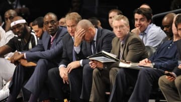 Dec 3, 2013; Brooklyn, NY, USA; Brooklyn Nets head coach Jason Kidd (center) reacts during the second half against the Denver Nuggets at Barclays Center. The Nuggets won the game 111-87. Mandatory Credit: Joe Camporeale-USA TODAY Sports