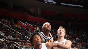 DETROIT, MI - FEBRUARY 4: Stanley Johnson #7 of the Detroit Pistons, Torrey Craig #3 of the Denver Nuggets, and Luke Kennard #5 of the Detroit Pistons fight for position on February 4, 2019 at Little Caesars Arena in Detroit, Michigan. NOTE TO USER: User expressly acknowledges and agrees that, by downloading and/or using this photograph, User is consenting to the terms and conditions of the Getty Images License Agreement. Mandatory Copyright Notice: Copyright 2019 NBAE (Photo by Chris Schwegler/NBAE via Getty Images)
