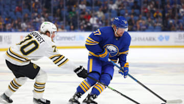 Sep 26, 2023; Buffalo, New York, USA; Buffalo Sabres center Casey Mittelstadt (37) controls the puck as Boston Bruins goaltender Brandon Bussi (70) defends during the second period at KeyBank Center. Mandatory Credit: Timothy T. Ludwig-USA TODAY Sports