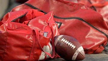 WEST LAFAYETTE, IN - OCTOBER 28: A footbal and equipment bags sit on the sidelines before the start of the Big Ten conference game between the Purdue Boilermakers and the Nebraska Cornhuskers on October 28, 2017, at Ross-Ade Stadium in West Lafayette, Indiana. (Photo by Michael Allio/Icon Sportswire via Getty Images)