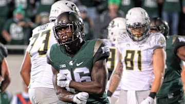 Sep 12, 2015; East Lansing, MI, USA; Michigan State Spartans safety Rj Williamson (26) celebrates goal line stand against the Oregon Ducks during the 1st half of a game at Spartan Stadium. Mandatory Credit: Mike Carter-USA TODAY Sports