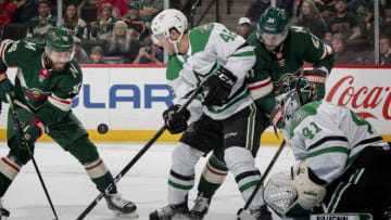 St. Paul, MN-September 17: Jason Zucker (16) of the Minnesota Wild and Taylor Fedun (42) of the Dallas Stars fought for the puck in the first period. (Photo by Carlos Gonzalez/Star Tribune via Getty Images)