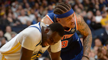 OAKLAND, CA - JANUARY 23: Draymond Green #23 of the Golden State Warriors and Michael Beasley #8 of the New York Knicks during the game on January 23, 2018 at ORACLE Arena in Oakland, California. Copyright 2018 NBAE (Photo by Noah Graham/NBAE via Getty Images)