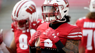 MADISON, WISCONSIN - SEPTEMBER 11: Chez Mellusi #6 of the Wisconsin Badgers before the game against the Eastern Michigan Eagles at Camp Randall Stadium on September 11, 2021 in Madison, Wisconsin. Badgers defeated the Eagles 34-7. (Photo by John Fisher/Getty Images)