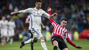 MADRID - OCTOBER 23: Cristiano Ronaldo (l) of Real Madrid battles for the ball with Aymeric Laporte of Athletic Club during their La Liga match between Real Madrid and Athletic Club at the Santiago Bernabeu Stadium on 23 October 2016 in Madrid, Spain. (Photo by Power Sport Images/Getty Images)