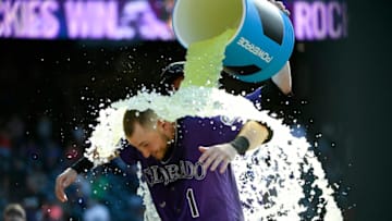 DENVER, CO - AUGUST 18: Colorado Rockies Garrett Hampson, #1, center, gets doused with Gatorade by teammate Charlie Blackmon after Hampson's walkoff, RBI-single in the 10th inning won the game for the Rockies against the Miami Marlins at Coors Field on August 18, 2019 in Denver, Colorado. The Rockies beat the Marlins 7-6. Garrett Hampson singled on a fly ball to left fielder Harold Ramirez allowing Yonathan Daza to score winning the game for the Rockies. (Photo by Helen H. Richardson/MediaNews Group/The Denver Post via Getty Images)