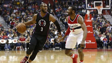 Dec 28, 2015; Washington, DC, USA; Los Angeles Clippers guard Chris Paul (3) dribbles the ball as Washington Wizards guard John Wall (2) defends in the second quarter at Verizon Center. The Clippers won 108-91. Mandatory Credit: Geoff Burke-USA TODAY Sports