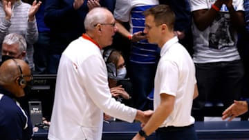 Duke basketball head coach Jon Scheyer and Syracuse head coach Jim Boeheim (Photo by Lance King/Getty Images)