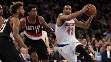 Mar 1, 2016; New York, NY, USA; New York Knicks forward Lance Thomas (42) drives to the basket past Portland Trail Blazers center Ed Davis (17) during the second half at Madison Square Garden. The Trail Blazers defeated the Knicks 104-85. Mandatory Credit: Adam Hunger-USA TODAY Sports