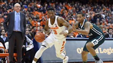 Dec 19, 2016; Syracuse, NY, USA; Syracuse Orange guard Andrew White III (3) dribbles the ball past Eastern Michigan Eagles forward Quaran Jones (21) during the second half at the Carrier Dome. The Orange won 105-57. Mandatory Credit: Rich Barnes-USA TODAY Sports