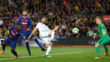 BARCELONA, SPAIN - MAY 06: Karim Benzema of Real Madrid shoots as Marc-Andre ter Stegen of Barcelona attempts to save during the La Liga match between Barcelona and Real Madrid at Camp Nou on May 6, 2018 in Barcelona, Spain. (Photo by Alex Caparros/Getty Images)