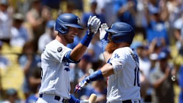 LOS ANGELES, CA - AUGUST 11: Justin Turner #10 of the Los Angeles Dodgers celebrates his two-run home run with Cody Bellinger #35 against the Arizona Diamondbacks during the first inning at Dodger Stadium on August 11, 2019 in Los Angeles, California. Joc Pederson #31 of the Los Angeles Dodgers scored on Turner's home run. (Photo by Kevork Djansezian/Getty Images)