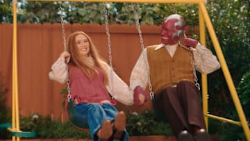 Elizabeth Olsen as Wanda Maximoff and Paul Bettany as Vision in Marvel Studios' WANDAVISION. Photo courtesy of Marvel Studios. ©Marvel Studios 2021. All Rights Reserved.