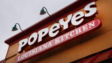 CHICAGO, ILLINOIS - MAY 06: A sign hangs outside of a Popeyes Louisiana Kitchen restaurant on May 06, 2021 in Chicago, Illinois. Chicken prices have risen sharply this year as suppliers struggle to keep up with demand, fueled in part, by the popularity of new chicken offerings from fast-food restaurants. (Photo by Scott Olson/Getty Images)