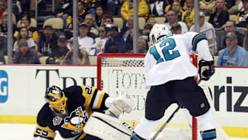 Oct 20, 2016; Pittsburgh, PA, USA; San Jose Sharks left wing Patrick Marleau (12) scores a goal against Pittsburgh Penguins goalie Marc-Andre Fleury (29) during the second period at the PPG Paints Arena. Mandatory Credit: Charles LeClaire-USA TODAY Sports