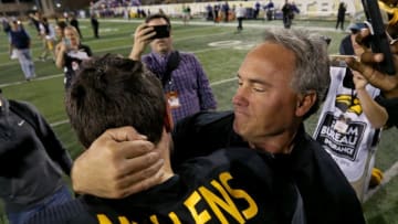 Nov 25, 2016; Hattiesburg, MS, USA; Southern Miss Golden Eagles head coach Jay Hopson hugs quarterback Nick Mullens (9) after their game against the Louisiana Tech Bulldogs at M.M. Roberts Stadium. Southern Miss won, 39-24. Mandatory Credit: Chuck Cook-USA TODAY Sports