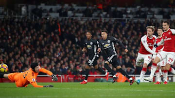 LONDON, ENGLAND - DECEMBER 02: Jesse Lingard of Manchester United scores his sides second goal as Nacho Monreal of Arsenal attempts to tackle him during the Premier League match between Arsenal and Manchester United at Emirates Stadium on December 2, 2017 in London, England. (Photo by Julian Finney/Getty Images)