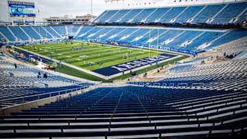 The Kentucky Wildcats and Vanderbilt Commodores practice in a mostly empty stadium prior to kick off at Kroger Field. Mandatory Credit: Arden Barnes-USA TODAY Sports