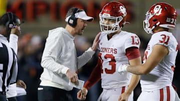 Quarterback Caleb Williams (13) came to Oklahoma to play for coach Lincoln Riley and he'll reunite with him at Southern Cal.tramel jump