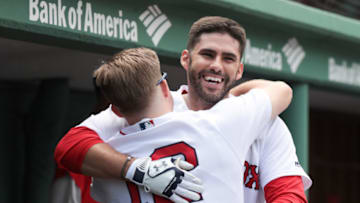 BOSTON, MA - JULY 14: J.D. Martinez #28 and Brock Holt #12 of the Boston Red Sox celebrate in the dugout in the bottom of the fourth inning of the game against the Toronto Blue Jays at Fenway Park on July 14, 2018 in Boston, Massachusetts. (Photo by Omar Rawlings/Getty Images)