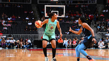 ATLANTA, GA - SEPTEMBER 8: Tanisha Wright #30 of the New York Liberty handles the ball against the Atlanta Dream on September 8, 2019 at the State Farm Arena in Atlanta, Georgia. NOTE TO USER: User expressly acknowledges and agrees that, by downloading and or using this photograph, User is consenting to the terms and conditions of the Getty Images License Agreement. Mandatory Copyright Notice: Copyright 2019 NBAE (Photo by Scott Cunningham/NBAE via Getty Images)
