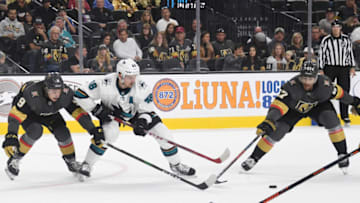 LAS VEGAS, NEVADA - SEPTEMBER 29: Tomas Hertl #48 of the San Jose Sharks skates with the puck against Cody Glass #9 and Max Pacioretty #67 of the Vegas Golden Knights in the first period of their preseason game at T-Mobile Arena on September 29, 2019 in Las Vegas, Nevada. (Photo by Ethan Miller/Getty Images)