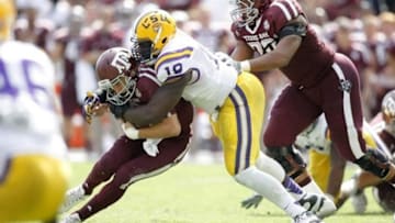 Oct 20, 2012; College Station, TX, USA; LSU Tigers defensive tackle Bennie Logan (18) tackles Texas A