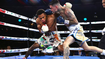 MELBOURNE, AUSTRALIA - JUNE 05: Devin Haney (L) and George Kambosos Jnr (R) exchange punches during their World Lightweight Undisputed Championship fight, at Marvel Stadium on June 05, 2022 in Melbourne, Australia. (Photo by Mikey Williams/Top Rank Inc via Getty Images)