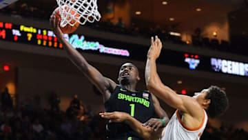 LAS VEGAS, NEVADA - NOVEMBER 23: Joshua Langford #1 of the Michigan State Spartans shoots against Jericho Sims #20 of the Texas Longhorns during the championship game of the 2018 Continental Tire Las Vegas Invitational basketball tournament at the Orleans Arena on November 23, 2018 in Las Vegas, Nevada. Michigan State defeated Texas 78-68. (Photo by Sam Wasson/Getty Images)