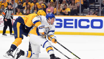 Jan 14, 2023; Nashville, Tennessee, USA; Buffalo Sabres left wing Jeff Skinner (53) loses the puck as he is defended by Nashville Predators defenseman Jeremy Lauzon (3) during the second period at Bridgestone Arena. Mandatory Credit: Christopher Hanewinckel-USA TODAY Sports