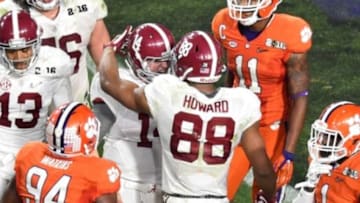 Jan 11, 2016; Glendale, AZ, USA; Alabama Crimson Tide quarterback Jake Coker (14) celebrates a run with tight end O.J. Howard (88) during the fourth quarter against the Clemson Tigers in the 2016 CFP National Championship at University of Phoenix Stadium. Mandatory Credit: Gary A. Vasquez-USA TODAY Sports